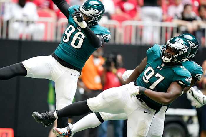 Derek Barnett (96) and Javon Hargrave celebrate a sack